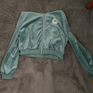 Zip up green hoodie with flower